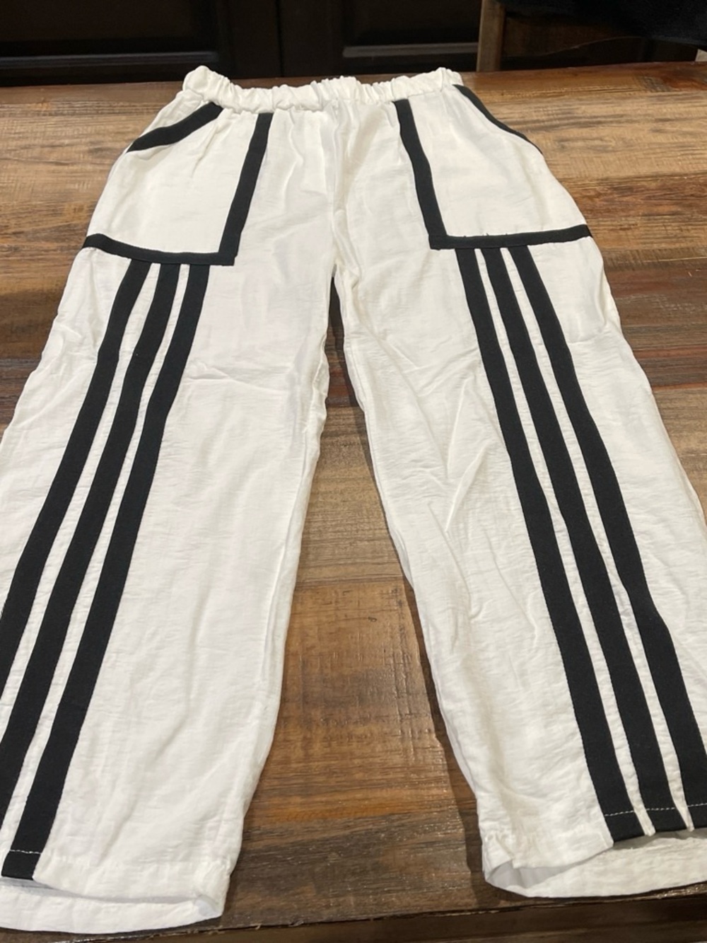 White Wide-Leg Pants with Black Stripe Detail
